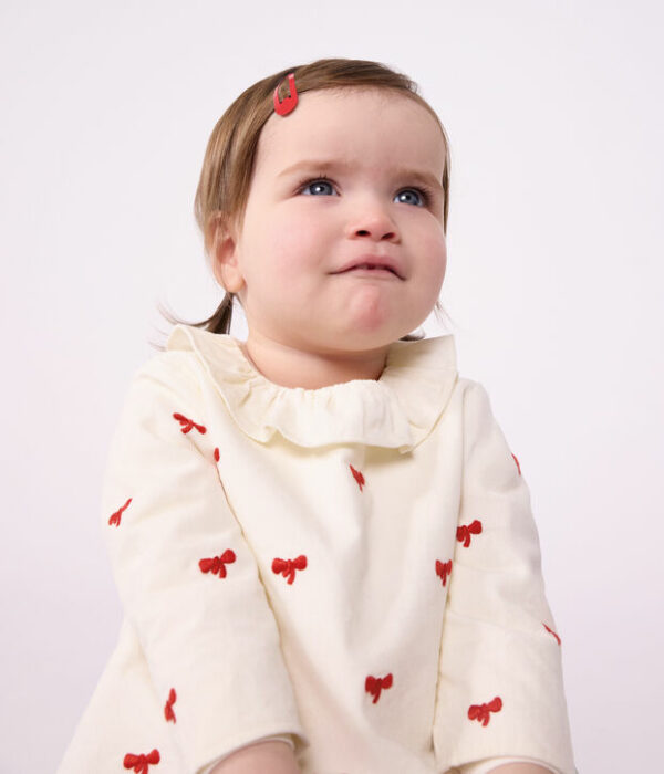 Blouse bébé en velours brodé motif nœuds